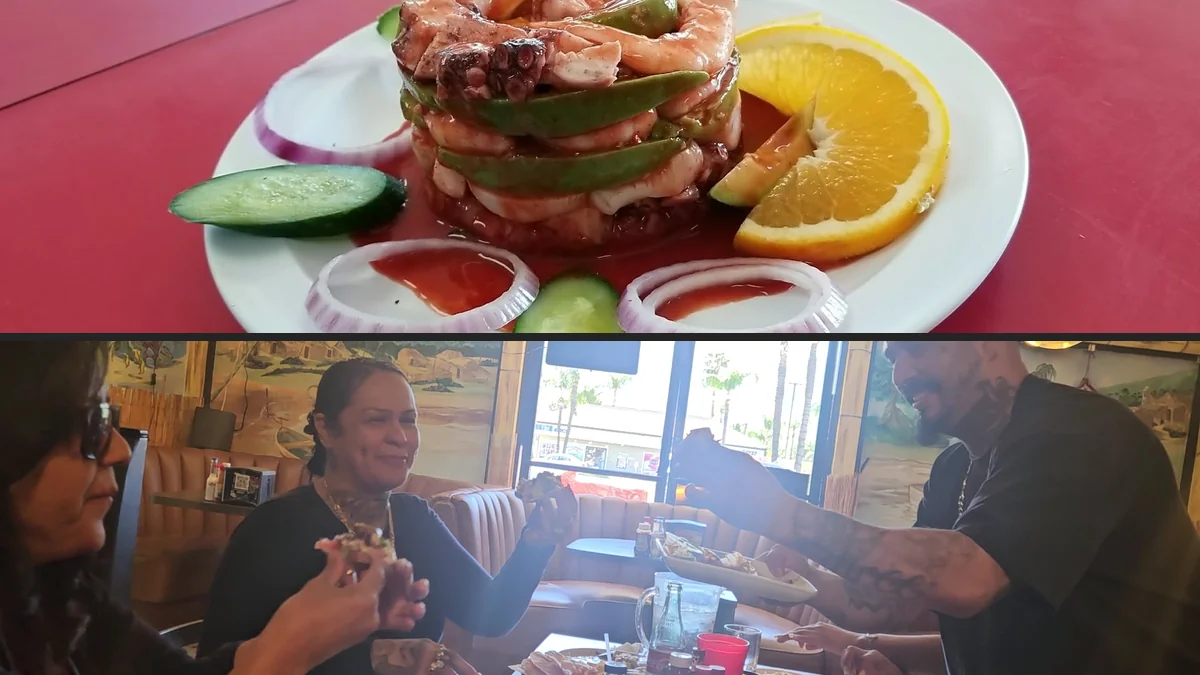 Fresh seafood plates beside lime wedges.